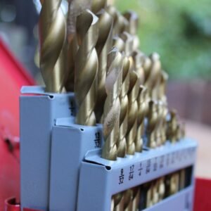 High-quality drill bits in a red toolbox, ideal for construction projects.
